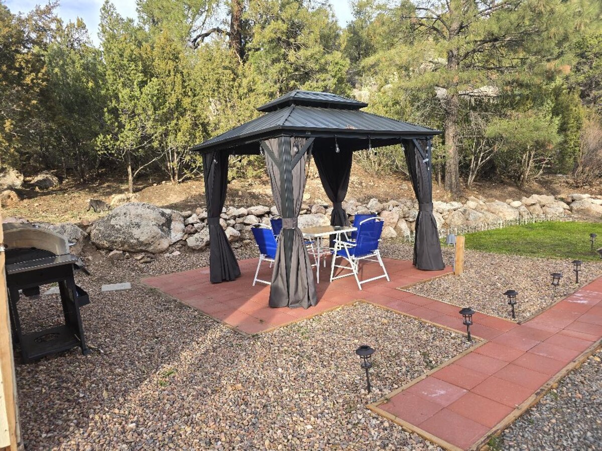 Starlight Luxury site with gazebo, patio, and grass patch